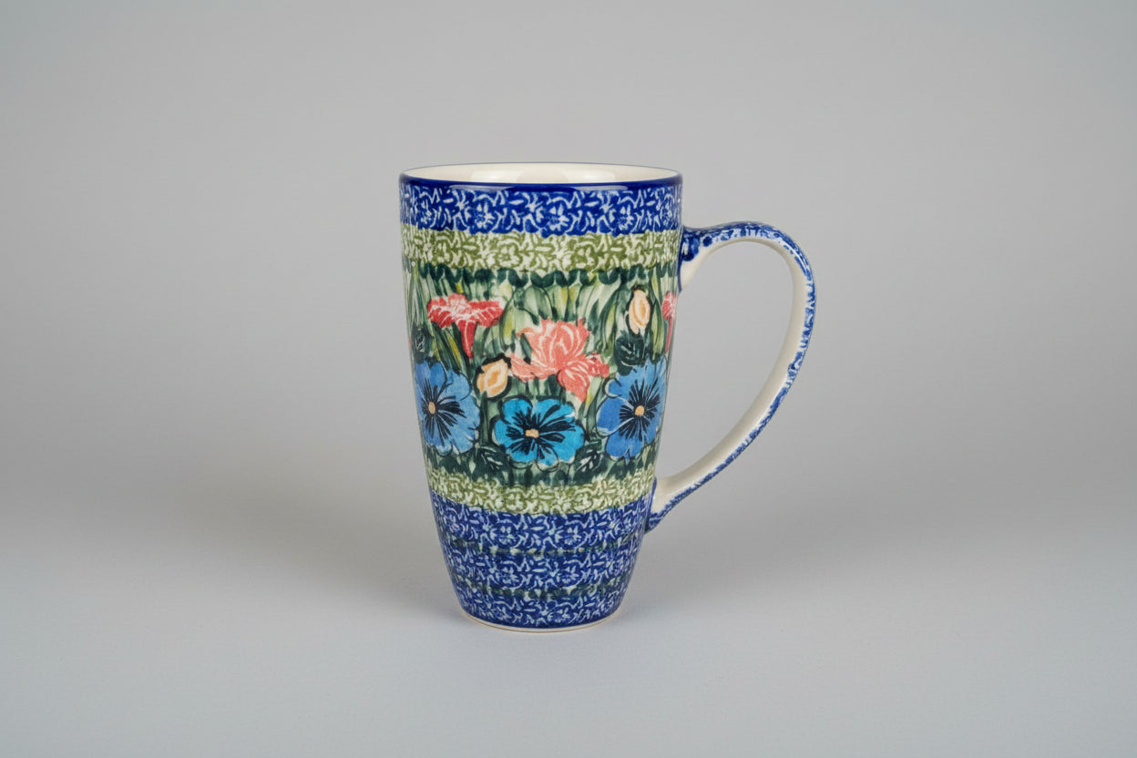 Decorative mug with floral pattern on a lace tablecloth