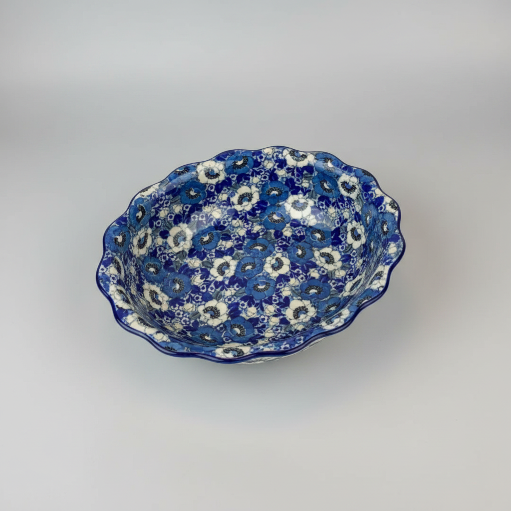 Ceramic bowl with blue and white floral pattern on a marble surface