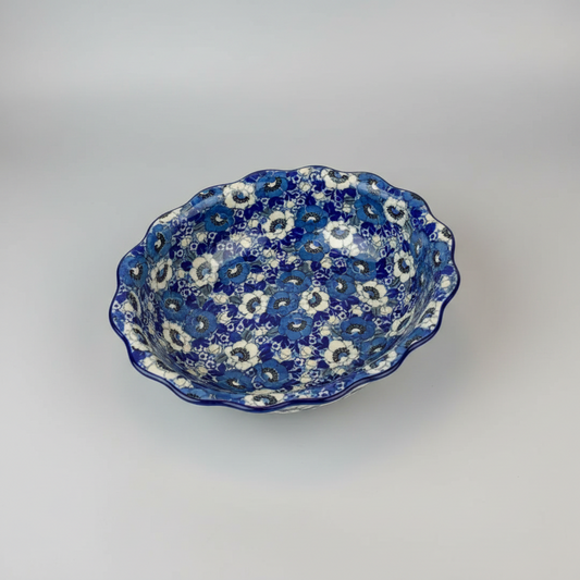 Ceramic bowl with blue and white floral pattern on a marble surface