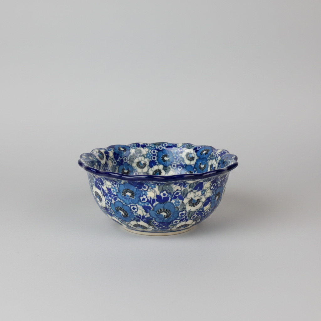 Ceramic bowl with blue floral pattern on a marble background