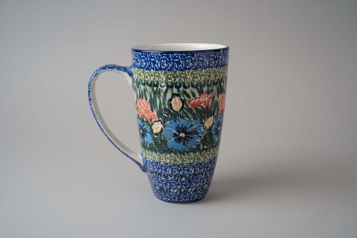 Decorative mug with floral pattern on a textured surface